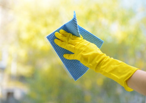 Airbnb cleaning checklist and fresh short-term rental bedroom