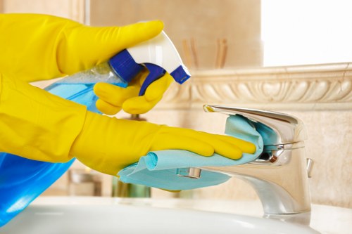 Professional sofa cleaning of a fabric couch in a living room